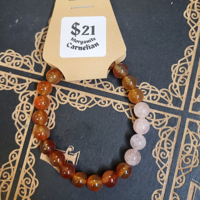 Beaded bracelet with a price tag on a decorative book