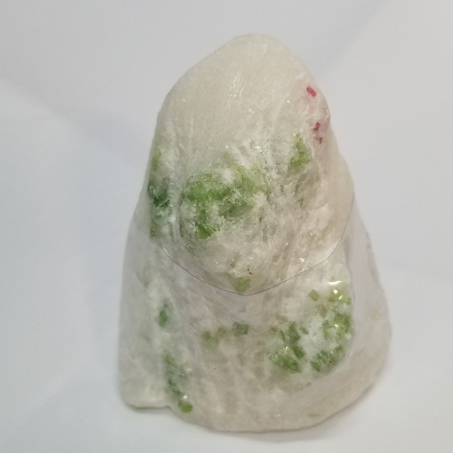 Green Spinel on Marble