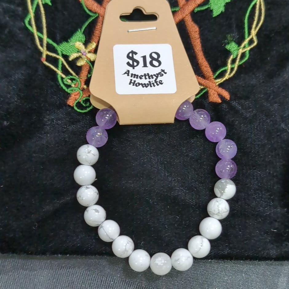 Beaded bracelet with a price tag on a black background