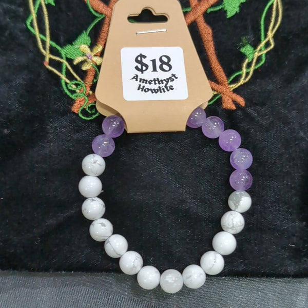 Beaded bracelet with a price tag on a black background