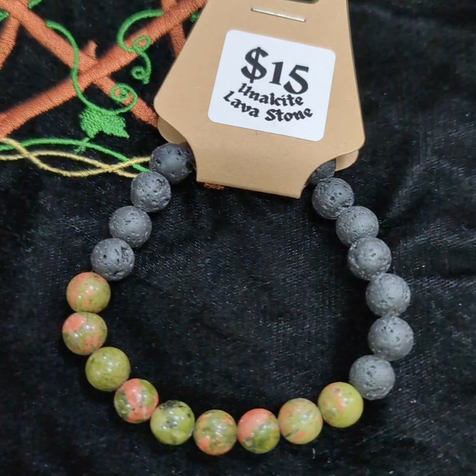 Beaded bracelet with a price tag on a dark background